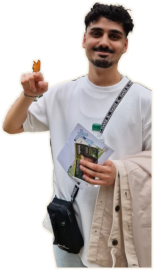 Kerim Ismail with a butterfly on his finger